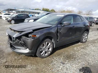 2021 Mazda CX-30 Premium with VIN 3MVDMBDM2MM233751, listed as a Copart auction lot 45361605 with 66,387 mi miles and Salvage Title. Bid and sale history available at carsss.com. Image 1.