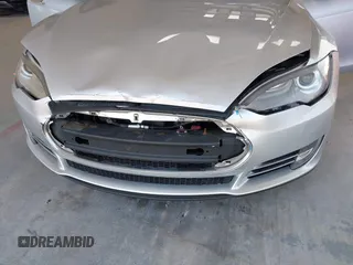 2013 Tesla Model S Performance with VIN 5YJSA1DP6DFP07999, listed as a IAAI auction lot 42284612 with 123,261 mi miles and . Bid and sale history available at DreamBid. Image 6.