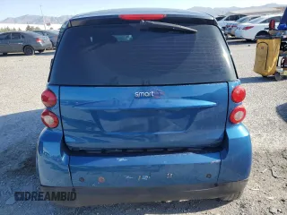 2009 Smart fortwo Pure z VIN WMEEJ31X39K273968, wystawiony jako Copart lot #56888045 z przebiegiem 125 138 mil mil oraz Szkody całkowita. Historia ofert i sprzedaży dostępna na DreamBid. Obrazek 6.