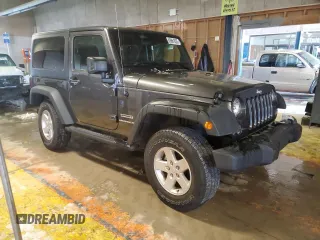 2017 Jeep Wrangler Willys Wheeler with VIN 1C4AJWAG3HL751703, listed as a Copart auction lot 88861635 with 14,114 mi miles and Salvage Title. Bid and sale history available at DreamBid. Image 4.