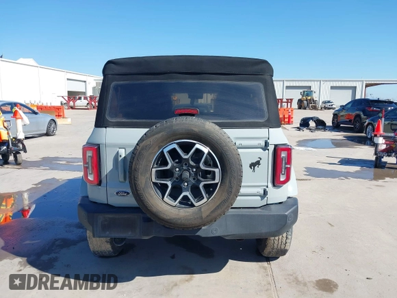 2021 Ford Bronco with VIN 1FMDE5BHXMLB06040, listed as a IAAI auction lot 41490539 with 57,915 mi miles. Bid and sale history available at carsss.com. Image 16.