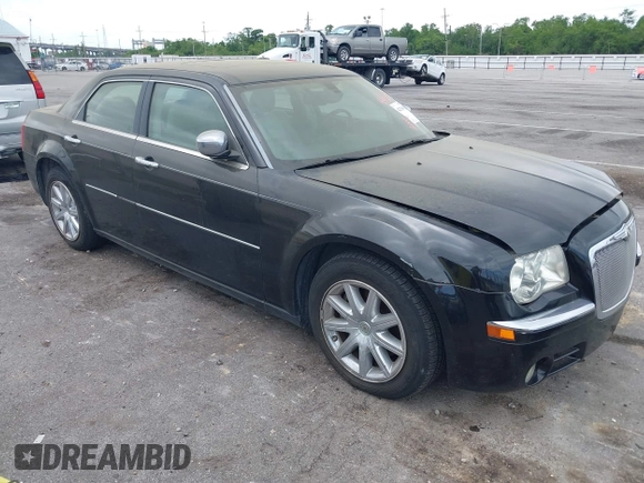 2007 Chrysler 300 C with VIN 2C3LA63H97H861511, listed as a IAAI auction lot 42136495 with 113,972 mi miles. Bid and sale history available at carsss.com. Image 1.
