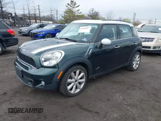 2011 MINI Countryman S with VIN WMWZC5C54BWL54135, listed as a IAAI auction lot 42034897 with 130,082 mi miles and . Bid and sale history available at DreamBid. Image 2.