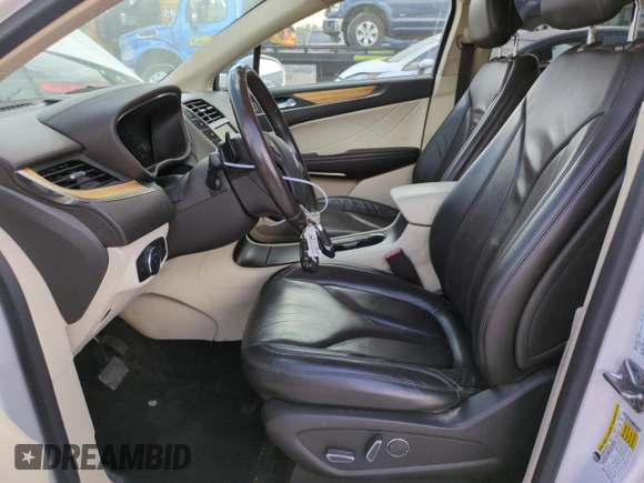 2016 Lincoln MKC Select with VIN 5LMCJ2D9XGUJ22052, listed as a Copart auction lot 71484584 with 88,799 mi miles and Salvage Title. Bid and sale history available at DreamBid. Image 7.