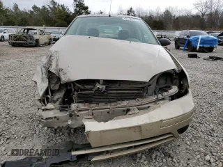 2007 Ford Focus S with VIN 1FAFP34N07W242359, listed as a Copart auction lot 61677025 with 164,445 mi miles and Salvage title. Bid and sale history available at DreamBid. Image 5.