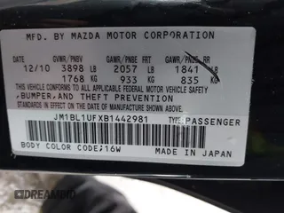2011 Mazda 3 i Sport with VIN JM1BL1UFXB1442981, listed as a IAAI auction lot 41974300 with 112,601 mi miles. Bid and sale history available at carsss.com. Image 9.