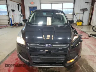 2016 Ford Escape SE with VIN 1FMCU9GX5GUB67512, listed as a Copart auction lot 53002675 with 141,033 mi miles and Salvage Title. Bid and sale history available at carsss.com. Image 5.