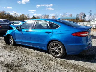 2020 Ford Fusion Hybrid Titanium with VIN 3FA6P0RU2LR156885, listed as a Copart auction lot 68011252 with 60,351 mi miles. Bid and sale history available at carsss.com. Image 2.