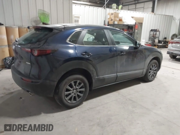 2023 Mazda CX-30 S with VIN 3MVDMBAM9PM586335, listed as a IAAI auction lot 41392541 with 12,463 mi miles and . Bid and sale history available at DreamBid. Image 4.