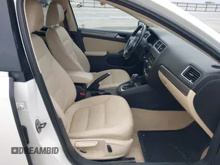 2014 Volkswagen Jetta TDI w/Premium with VIN 3VWLL7AJXEM372547, listed as a IAAI auction lot 42320105 with 113,200 mi miles and . Bid and sale history available at DreamBid. Image 5.