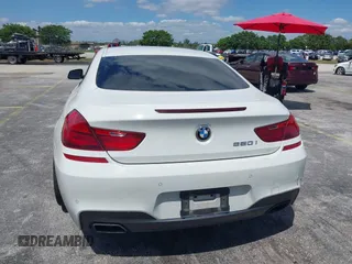 2014 BMW 6 Series 650i with VIN WBAYM9C55ED248244, listed as a IAAI auction lot 42043456 with 144,664 mi miles and . Bid and sale history available at DreamBid. Image 16.
