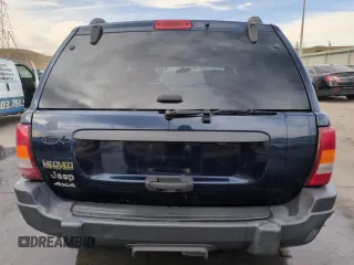 2004 Jeep Grand Cherokee Laredo with VIN 1J4GW48S84C200259, listed as a Copart auction lot 51002325 with 158,193 mi miles and Salvage Title. Bid and sale history available at carsss.com. Image 6.