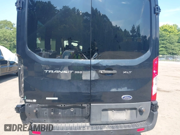 2019 Ford Transit Passenger XL with VIN 1FBAX2CG5KKA77205, listed as a IAAI auction lot 40028485 with 89,924 mi miles and . Bid and sale history available at carsss.com. Image 16.