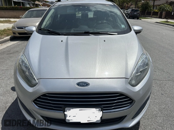 2015 Ford Fiesta SE z VIN 3FADP4EJ8FM167515, wystawiony jako IAAI lot #42153873 z przebiegiem 100 559 mil mil oraz . Historia ofert i sprzedaży dostępna na DreamBid. Obrazek 6.
