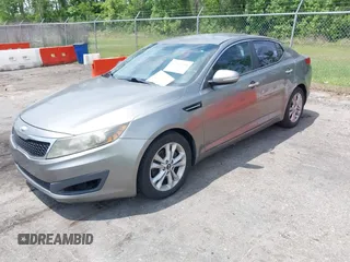 2013 Kia Optima LX with VIN 5XXGM4A77DG161195, listed as a IAAI auction lot 42241468 with 291,814 mi miles and . Bid and sale history available at carsss.com. Image 2.