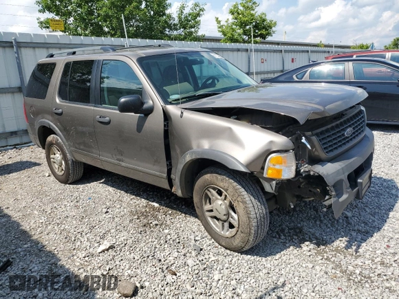 2003 Ford Explorer XLS with VIN 1FMZU72K43UB12036, listed as a Copart auction lot 61124985 with 210,901 mi miles and Salvage title. Bid and sale history available at DreamBid. Image 4.