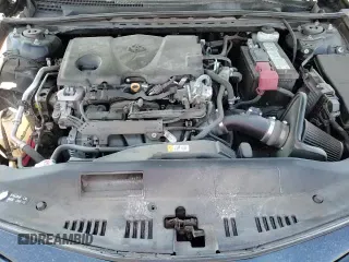 2021 Toyota Camry SE z VIN 4T1G11AK9MU526316, wystawiony jako Copart lot #70676595 z przebiegiem 85 227 mil mil oraz Szkoda całkowita • Salvage title. Historia ofert i sprzedaży dostępna na DreamBid. Obrazek 16.