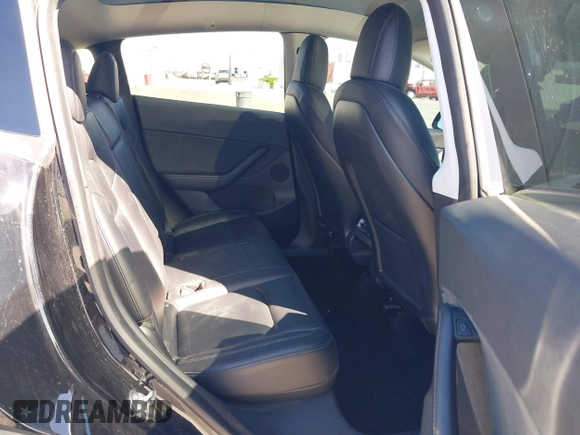 2021 Tesla Model Y Performance with VIN 5YJYGDEF9MF251738, listed as a IAAI auction lot 41708950 with 61,248 mi miles and . Bid and sale history available at DreamBid. Image 8.