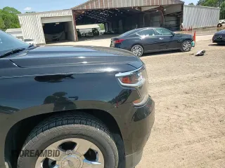 2016 Chevrolet Tahoe LT z VIN 1GNSCBKC2GR479117, wystawiony jako Copart lot #52332955 z przebiegiem 95 161 mil mil oraz Szkoda całkowita • Salvage title. Historia ofert i sprzedaży dostępna na DreamBid. Obrazek 11.