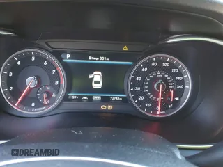2021 Genesis G70 2.0T with VIN KMTG34LA6MU075190, listed as a IAAI auction lot 41474675 with 72,743 mi miles and . Bid and sale history available at DreamBid. Image 7.