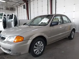 2000 Mazda Protege DX with VIN JM1BJ2221Y0239987, listed as a IAAI auction lot 42092488 with 140,756 mi miles and . Bid and sale history available at DreamBid. Image 6.