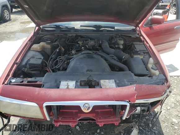1997 Mercury Grand Marquis GS z VIN 2MELM74W1VX611803, wystawiony jako Copart lot #54315505 z przebiegiem 156 152 mil mil oraz Szkoda całkowita • Salvage title. Historia ofert i sprzedaży dostępna na DreamBid. Obrazek 11.