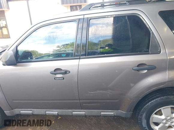 2010 Ford Escape XLT with VIN 1FMCU9D70AKD21499, listed as a IAAI auction lot 42039437 with 185,545 mi miles. Bid and sale history available at carsss.com. Image 14.