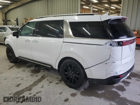 2023 Kia Carnival SX with VIN KNDNE5H37P6231312, listed as a Copart auction lot 44329745 with 55,492 mi miles and Salvage Title. Bid and sale history available at carsss.com. Image 2.