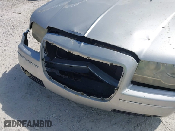 2006 Chrysler 300 Touring z VIN 2C3KA53G86H109231, wystawiony jako IAAI lot #42299031 z przebiegiem Nie podano mil oraz . Historia ofert i sprzedaży dostępna na DreamBid. Obrazek 6.