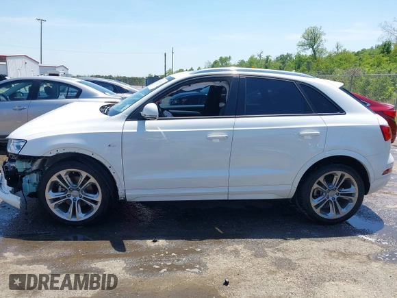 2018 Audi Q3 Premium with VIN WA1BCCFS4JR000455, listed as a IAAI auction lot 42042811 with 57,354 mi miles. Bid and sale history available at carsss.com. Image 14.