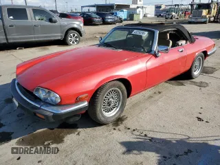 1989 Jaguar XJS z VIN SAJNV4849KC157115, wystawiony jako Copart lot #43228295 z przebiegiem 109 185 mil mil oraz Szkody całkowita. Historia ofert i sprzedaży dostępna na DreamBid. Obrazek 1.