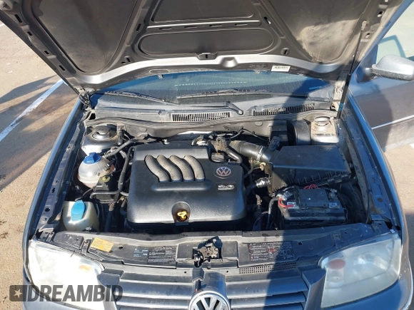 2004 Volkswagen Jetta GL z VIN 3VWRA69M64M044291, wystawiony jako IAAI lot #41882666 z przebiegiem 205 029 mil mil oraz . Historia ofert i sprzedaży dostępna na DreamBid. Obrazek 10.