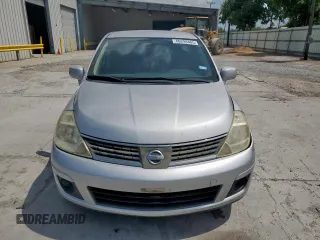 2009 Nissan Versa S with VIN 3N1BC11E39L376873, listed as a Copart auction lot 60299465 with 134,769 mi miles and Salvage title. Bid and sale history available at DreamBid. Image 5.