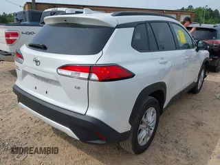 2022 Toyota Corolla Cross LE with VIN 7MUBAAAG6NV021369, listed as a IAAI auction lot 42282685 with 37,863 mi miles and . Bid and sale history available at DreamBid. Image 4.