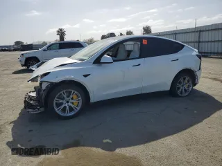 2021 Tesla Model Y Standard Range z VIN 5YJYGDED9MF110473, wystawiony jako Copart lot #53850085 z przebiegiem 46 242 mil mil oraz Szkody całkowita. Historia ofert i sprzedaży dostępna na DreamBid. Obrazek 1.