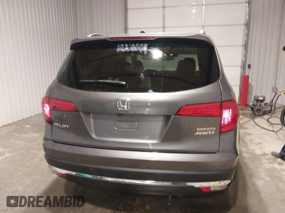 2017 Honda Pilot Touring with VIN 5FNYF6H91HB084737, listed as a IAAI auction lot 41608145 with 86,696 mi miles. Bid and sale history available at carsss.com. Image 16.
