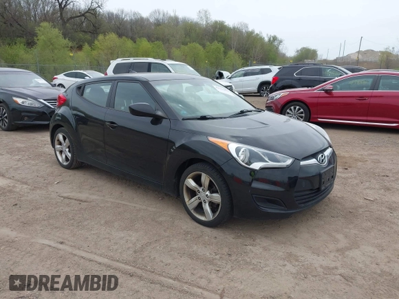 2013 Hyundai Veloster w/Gray Int with VIN KMHTC6AD6DU179826, listed as a IAAI auction lot 42151479 with 82,643 mi miles. Bid and sale history available at carsss.com. Image 1.