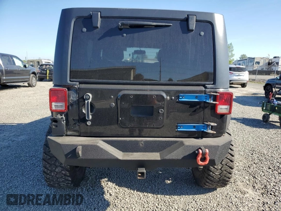 2014 Jeep Wrangler Unlimited Sport with VIN 1C4BJWDG1EL308834, listed as a Copart auction lot 53710065 with 127,612 mi miles and Clean Title. Bid and sale history available at DreamBid. Image 6.