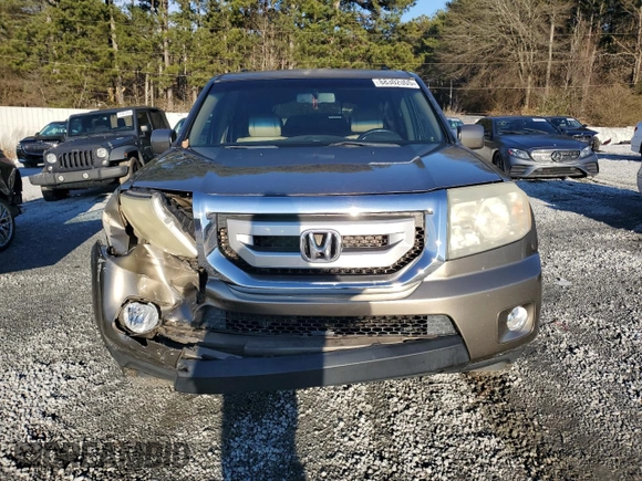 2011 Honda Pilot EX-L with VIN 5FNYF3H64BB032658, listed as a Copart auction lot 88302005 with 243,959 mi miles and Salvage Title. Bid and sale history available at DreamBid. Image 5.
