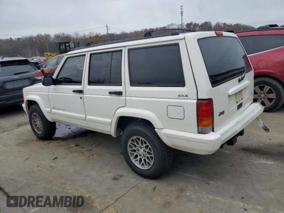 1997 Jeep Cherokee Country with VIN 1J4FJ78S9VL576899, listed as a Copart auction lot 82303584 with 335,746 mi miles and Salvage Title. Bid and sale history available at carsss.com. Image 2.