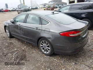 2017 Ford Fusion SE with VIN 3FA6P0HD3HR335350, listed as a IAAI auction lot 42201095 with 165,101 mi miles and . Bid and sale history available at DreamBid. Image 3.