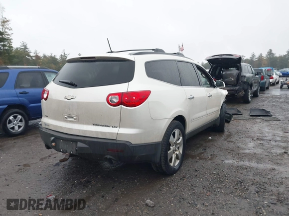 2011 Chevrolet Traverse LTZ with VIN 1GNKVLED5BJ385566, listed as a IAAI auction lot 40530314 with 166,155 mi miles and . Bid and sale history available at DreamBid. Image 4.