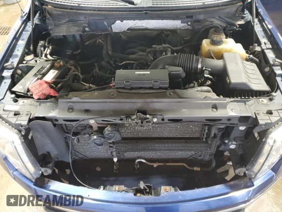 2012 Ford F-150 XL with VIN 1FTFW1EF0CFC58189, listed as a Copart auction lot 61142605 with 121,857 mi miles and Salvage title. Bid and sale history available at DreamBid. Image 11.