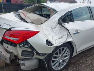2014 Buick LaCrosse Premium I with VIN 1G4GD5G36EF226642, listed as a IAAI auction lot 42611309 with 137,206 mi miles and . Bid and sale history available at DreamBid. Image 19.