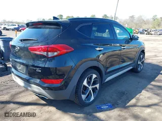 2018 Hyundai Tucson Value with VIN KM8J3CA26JU713729, listed as a IAAI auction lot 41950946 with 73,456 mi miles. Bid and sale history available at carsss.com. Image 4.