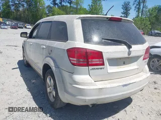 2009 Dodge Journey SXT with VIN 3D4GG57VX9T200489, listed as a IAAI auction lot 42048965 with 156,830 mi miles. Bid and sale history available at carsss.com. Image 3.
