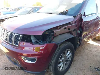 2021 Jeep Grand Cherokee Laredo E with VIN 1C4RJEAG3MC785745, listed as a IAAI auction lot 41498832 with 62,380 mi miles and . Bid and sale history available at DreamBid. Image 6.