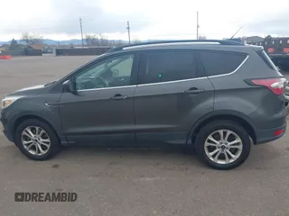 2017 Ford Escape SE with VIN 1FMCU9GD1HUB46034, listed as a IAAI auction lot 41840906 with 143,806 mi miles. Bid and sale history available at carsss.com. Image 14.