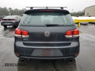 2013 Volkswagen GTI с VIN WVWGD7AJ3DW141277, выставлен на аукционе Copart как лот 51529385 с пробегом 75 137 миль миль и Списание • Salvage title. История ставок и продаж доступна на DreamBid. Изображение 6.