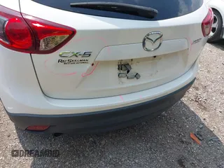 2016 Mazda CX-5 Sport with VIN JM3KE2BY6G0641051, listed as a IAAI auction lot 39959322 with 118,453 mi miles. Bid and sale history available at carsss.com. Image 15.